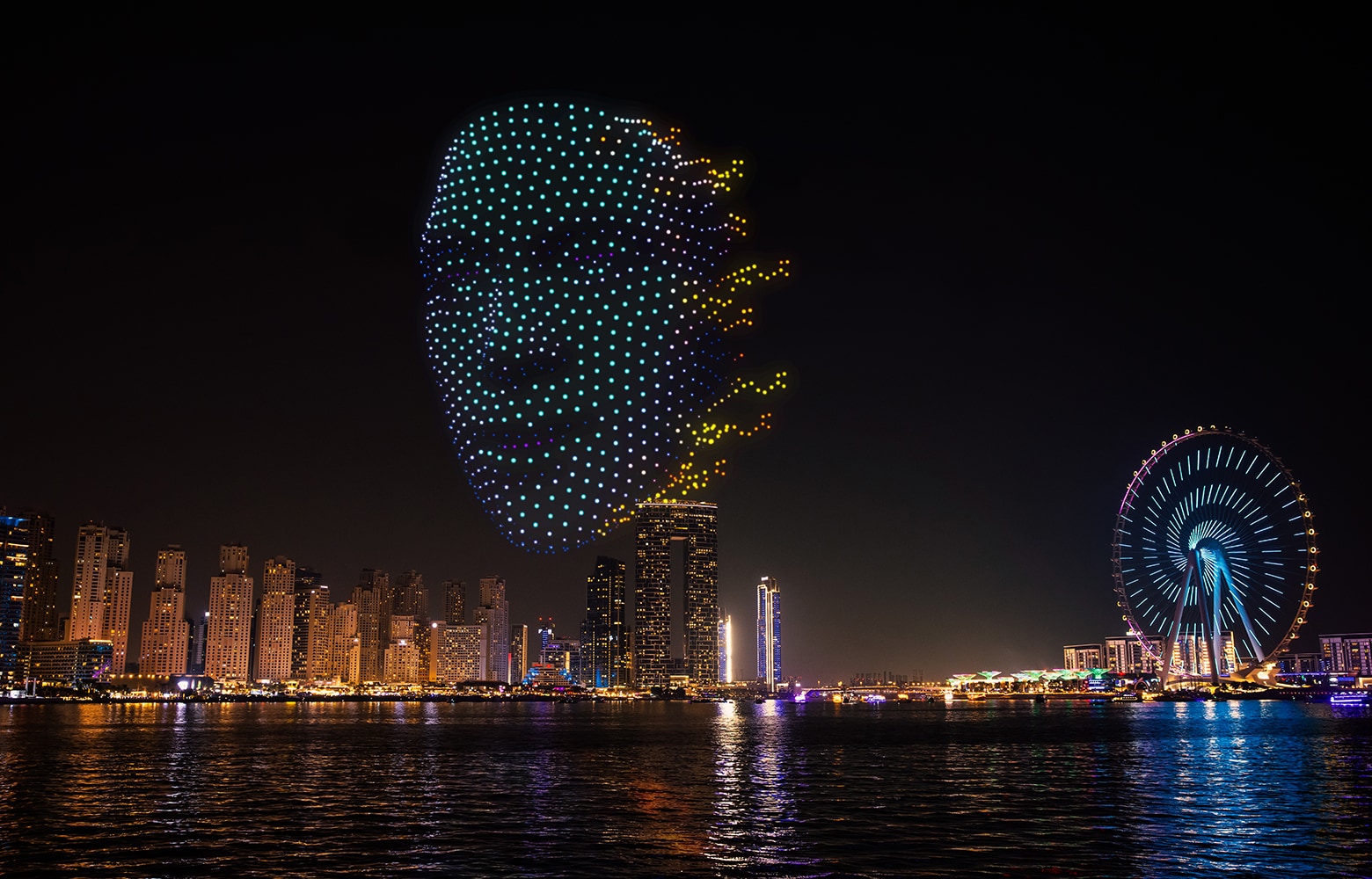 drone and fireworks show over Dubai skyline during dubai shopping festival 25-26 at night